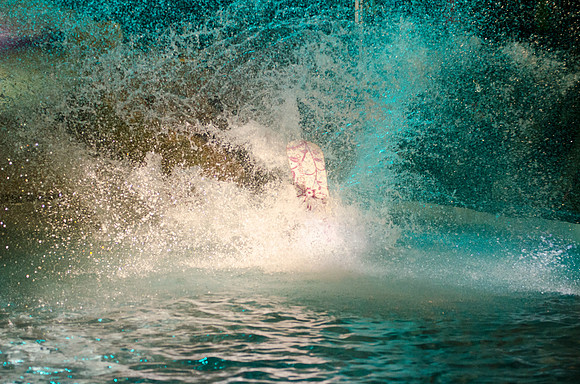 Students at Brigham Young University-Idaho take part in the annual Pond Skimming event held on campus at BYU-Idaho. Students wait in the cold or take the daring attempt to skim a pool of water using a