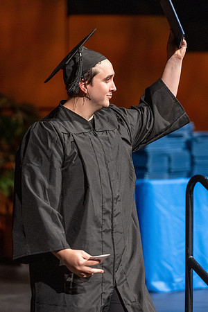 Combined Convocation for the College of Business & Communication and also the College of Physical Sciences & Engineering. Graduates receive their diploma covers.