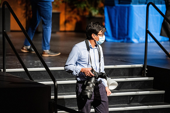 Combined Convocation for the College of Business & Communication and also the College of Physical Sciences & Engineering. Graduates receive their diploma covers.