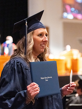 Combined Convocation for the College of Business & Communication and also the College of Physical Sciences & Engineering. Graduates receive their diploma covers.