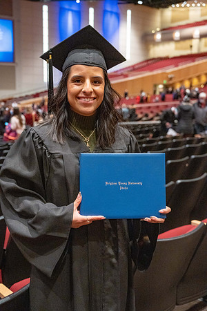 Combined Convocation for the College of Business & Communication and also the College of Physical Sciences & Engineering. Graduates receive their diploma covers.