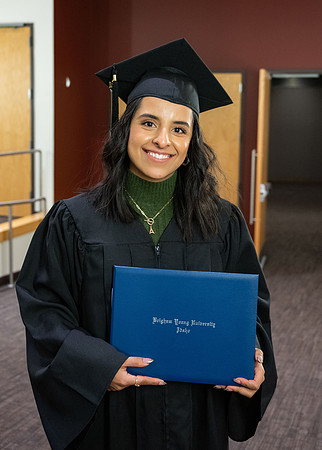 Combined Convocation for the College of Business & Communication and also the College of Physical Sciences & Engineering. Graduates receive their diploma covers.