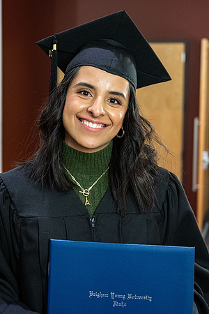 Combined Convocation for the College of Business & Communication and also the College of Physical Sciences & Engineering. Graduates receive their diploma covers.