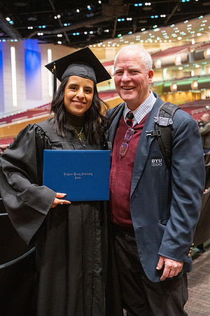 Combined Convocation for the College of Business & Communication and also the College of Physical Sciences & Engineering. Graduates receive their diploma covers.