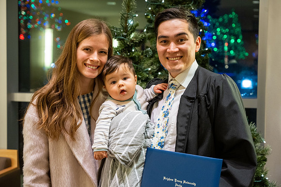 Combined Convocation for the College of Business & Communication and also the College of Physical Sciences & Engineering. Graduates receive their diploma covers.