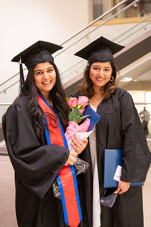 Combined Convocation for the College of Business & Communication and also the College of Physical Sciences & Engineering. Graduates receive their diploma covers.