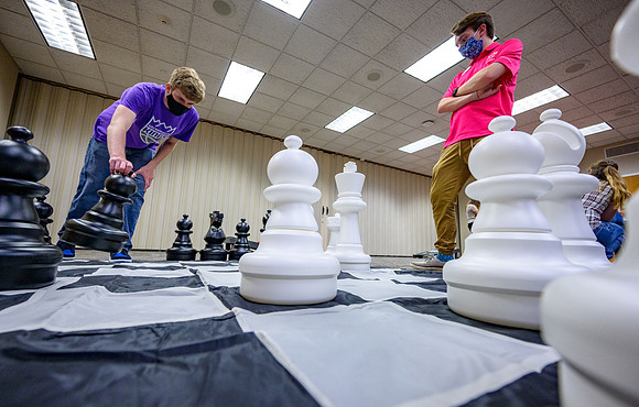 Vice President, Amy LaBaugh, Spot Safety video shoot as part of the "We Are In This Together" campaign. Student Social Activities, giant chess.
