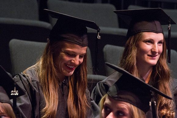 Dean's of the College of Performing and Visual Arts award diplomas to graduates during convocation held in the Snow Building.