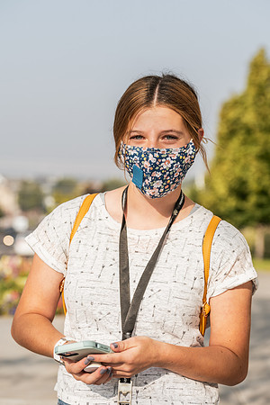 Students stay safe wearing masks and social distancing during the first day of school.