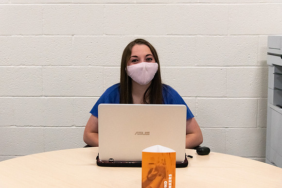 Students wearing face masks and studying on the first day of Fall semester.