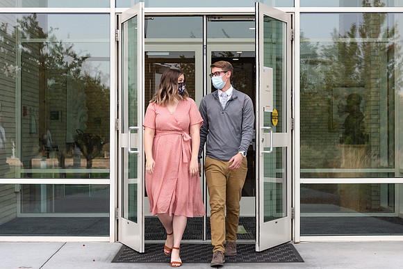 Students wearing face masks at church on campus.