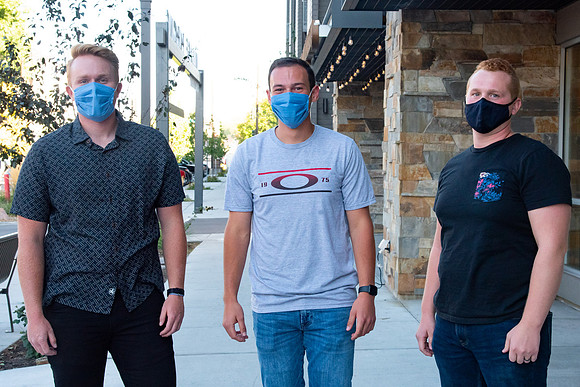 Students walking down the streets of Rexburg with roommates.