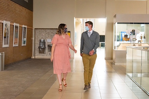 Students going to church on campus with face masks.
