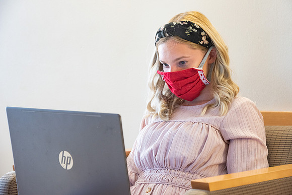 Students wearing face masks and studying on the first day of Fall semester.