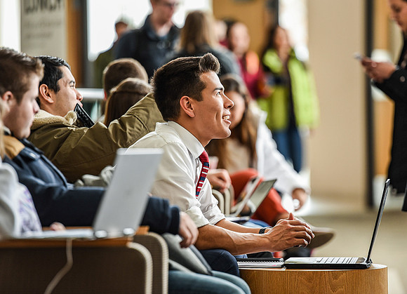 Students gather in the BYU-Idaho Center before devotional.