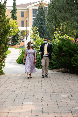 Students walking through the Thomas E. Ricks Gardens after church on a Sunday.