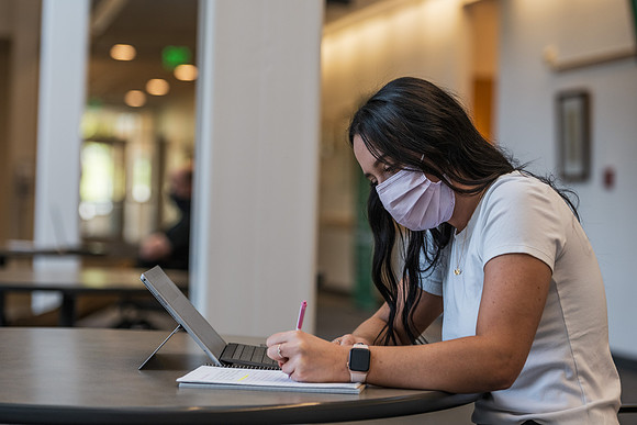 Students stay safe wearing masks and social distancing during the first day of school.