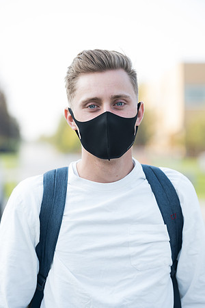 Students stay safe wearing masks and social distancing during the first day of school.