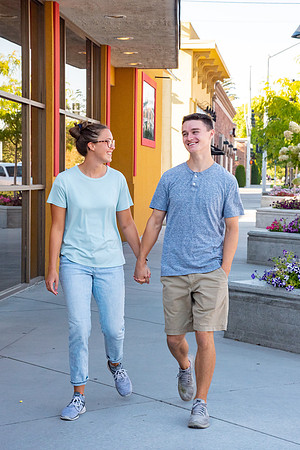 Students walking down the streets of Rexburg with roommates.