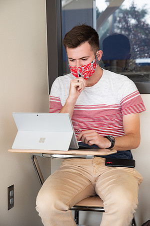 Students wearing face masks and studying on the first day of Fall semester.