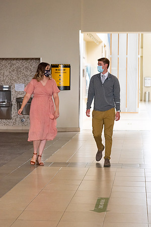 Students going to church on campus with face masks.