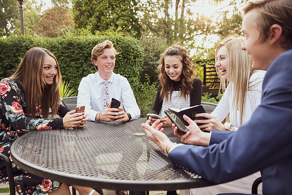Students stay safe wearing masks and social distancing in their sunday best.