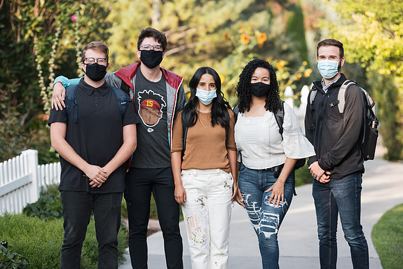 Students stay safe wearing masks and social distancing during the first day of school.