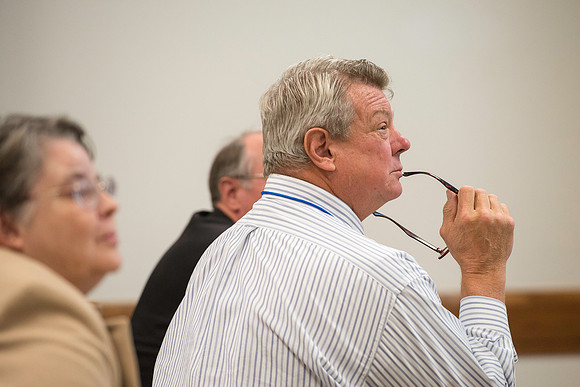 Faculty gather in the Hinckley Building for a conference to learn from their peers.