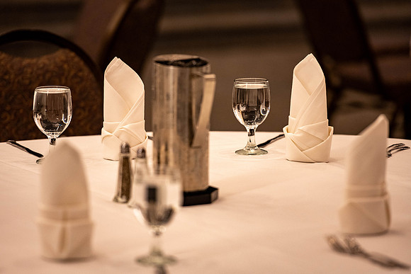 Students gather for a formal dinner, to celebrate a semester of success.