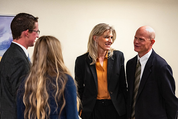 Students gather for a formal dinner, to celebrate a semester of success.