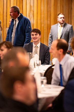 Students gather for a formal dinner, to celebrate a semester of success.