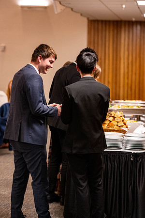 Students gather for a formal dinner, to celebrate a semester of success.