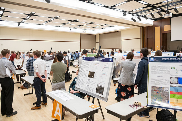 Students present their research at the R&CW Conference.