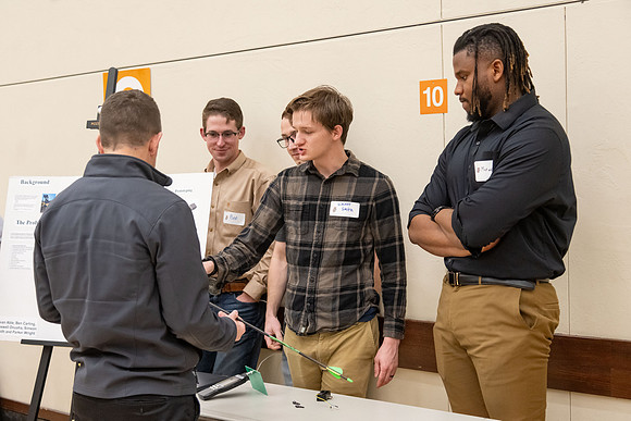 Students present their research at the R&CW Conference.
