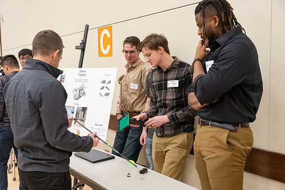 Students present their research at the R&CW Conference.