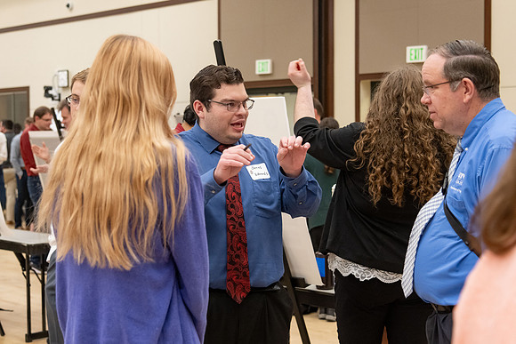Students present their research at the R&CW Conference.