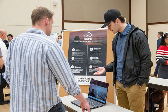 Students present their research at the R&CW Conference.