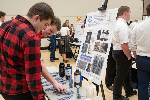 Students present their research at the R&CW Conference.