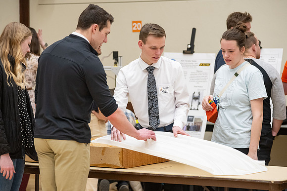 Students present their research at the R&CW Conference.