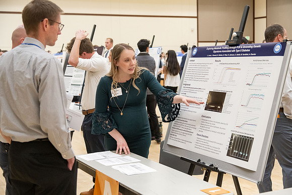 Students present their research at the R&CW Conference.