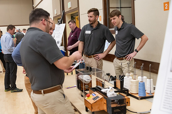 Students present their research at the R&CW Conference.