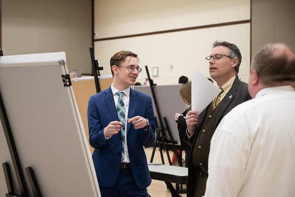 Students present their research at the R&CW Conference.