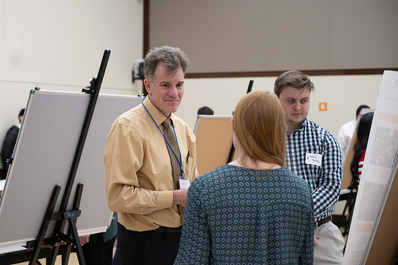 Students present their research at the R&CW Conference.