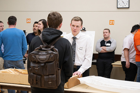 Students present their research at the R&CW Conference.