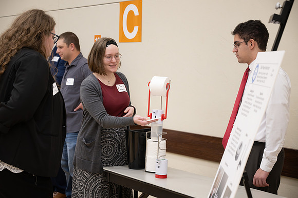 Students present their research at the R&CW Conference.