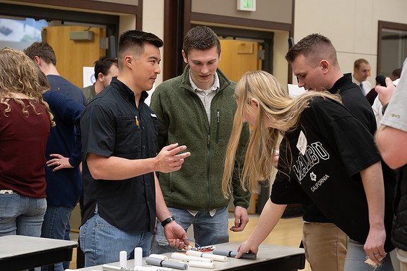 Students present their research at the R&CW Conference.