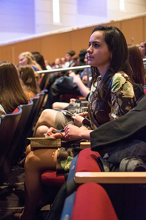 Students at Brigham Young University-Idaho taking notes during the Worldwide Devotional held in the BYU-Idaho Center on Sunday, 11 January, 2015.Photo by Ryan Chase
