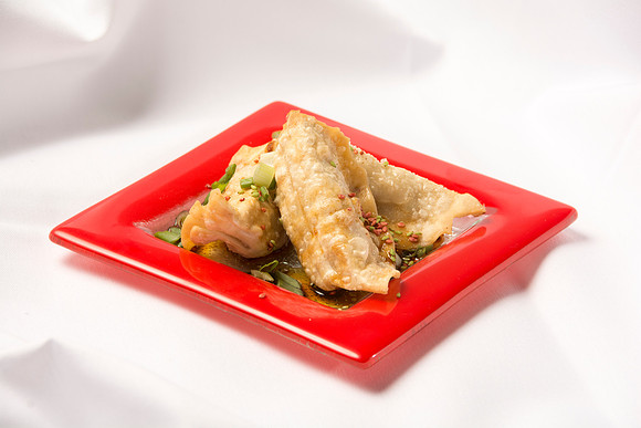 Served with soy sauce and stuffed with savory meat and vegtables.