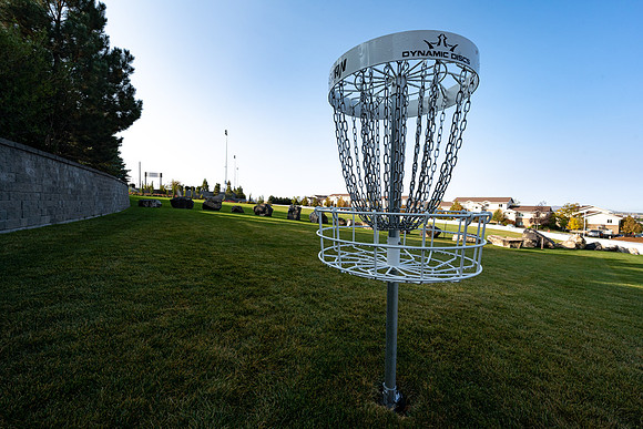 Frisbee golf course between upper play fields and University Village.