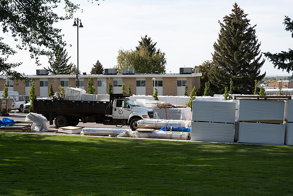 Work is still in progress to put new roofing material on Lamprecht and Chapman Hall office buildings. Work is part of the summer campus construction projects.